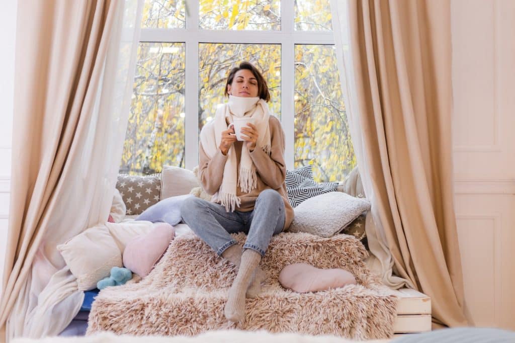 woman in front of vinyl window