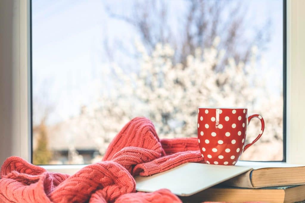 sealed window and mug in winter