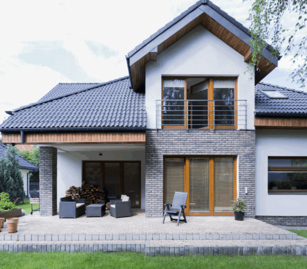 Modern house with brick patio.