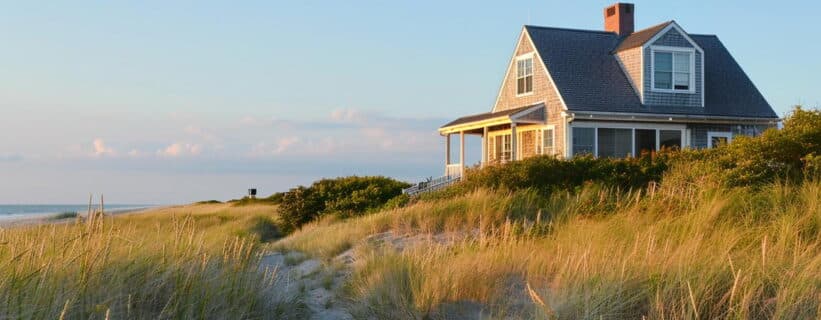 coastal Canadian home with double-hung windows and covered porch, window rebate program Canada