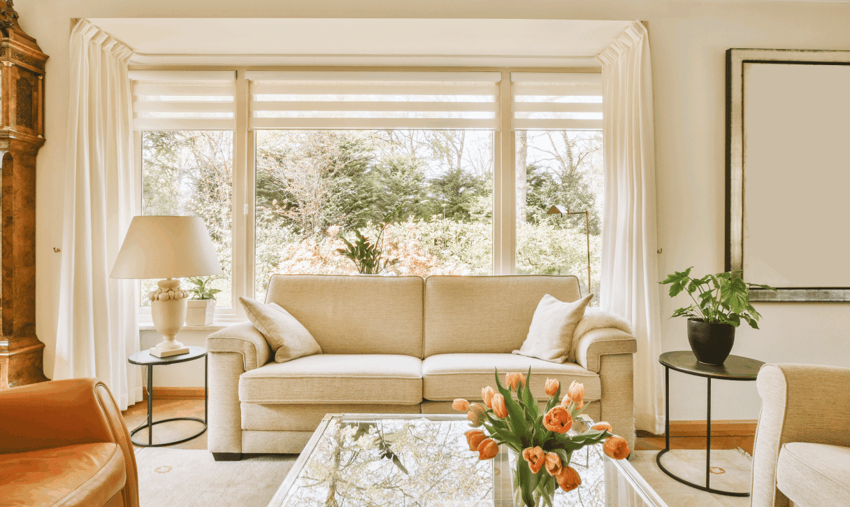 Bright living room with beige sofa.